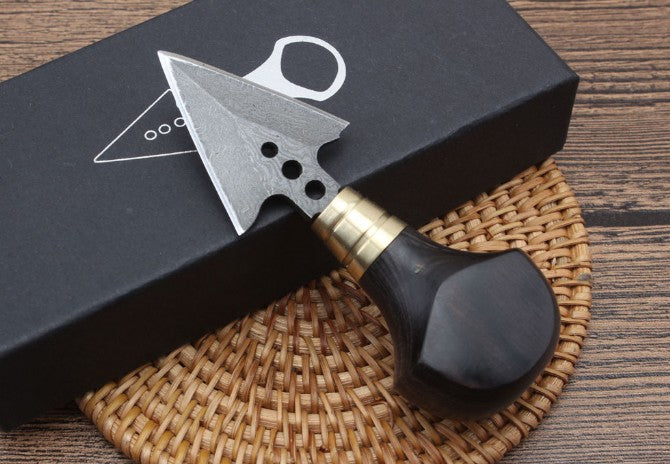 Ebony arrowhead hand stiletto