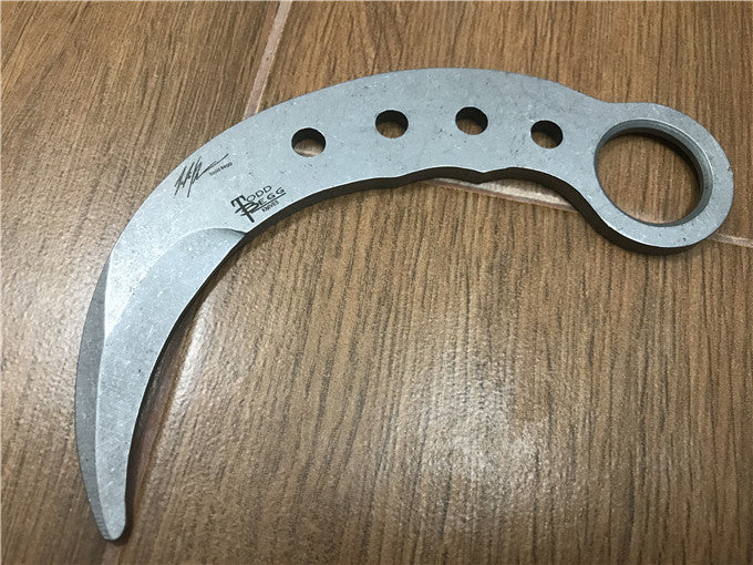 Non-sharp training claw