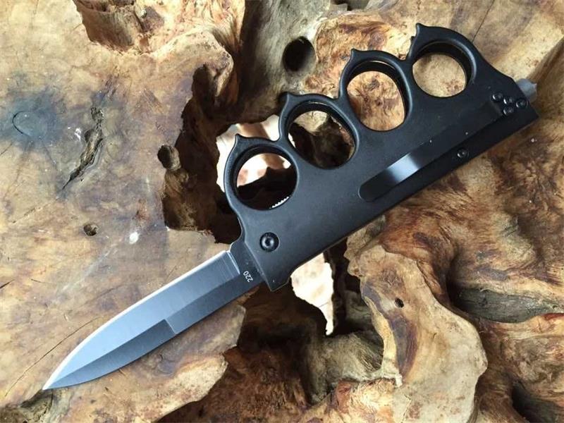Knuckle guard defensive folding knife