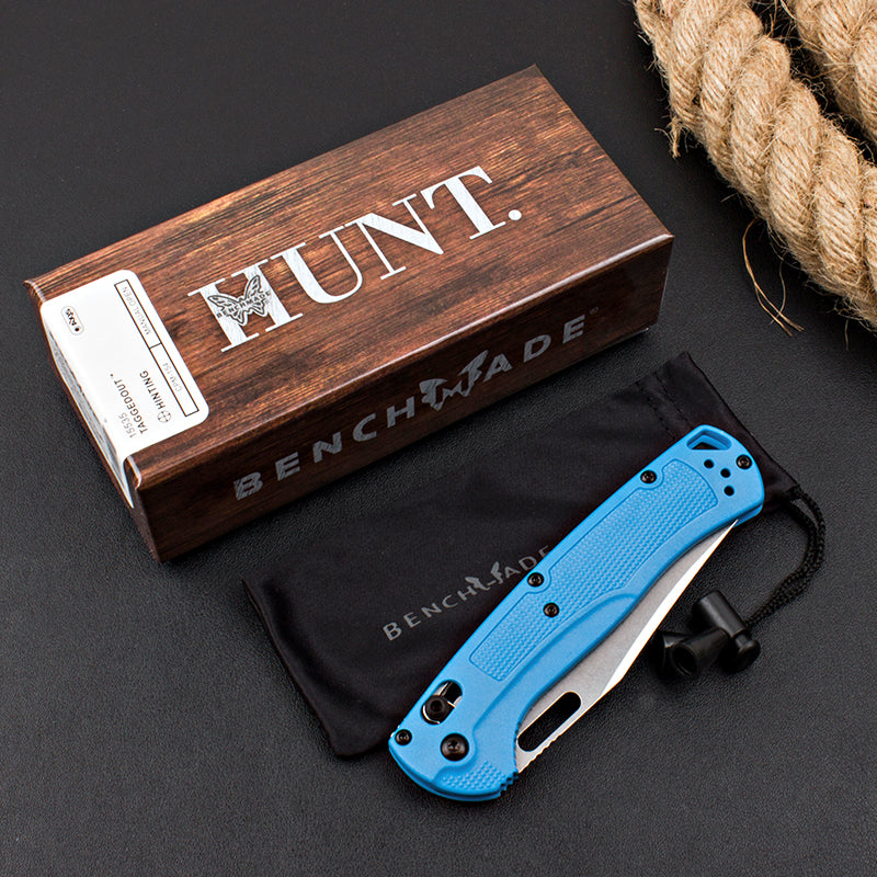 Axis-lock folding knife with fiberglass handle