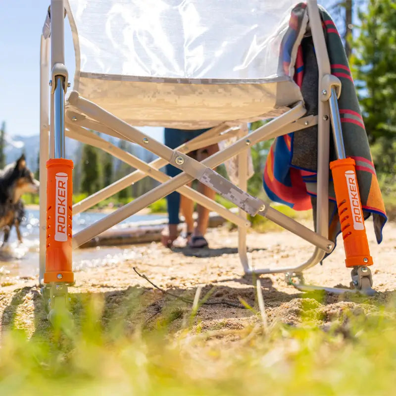 Close-up of the Snow Camo Freestyle Rocker Elite’s rocker mechanism on sandy terrain.