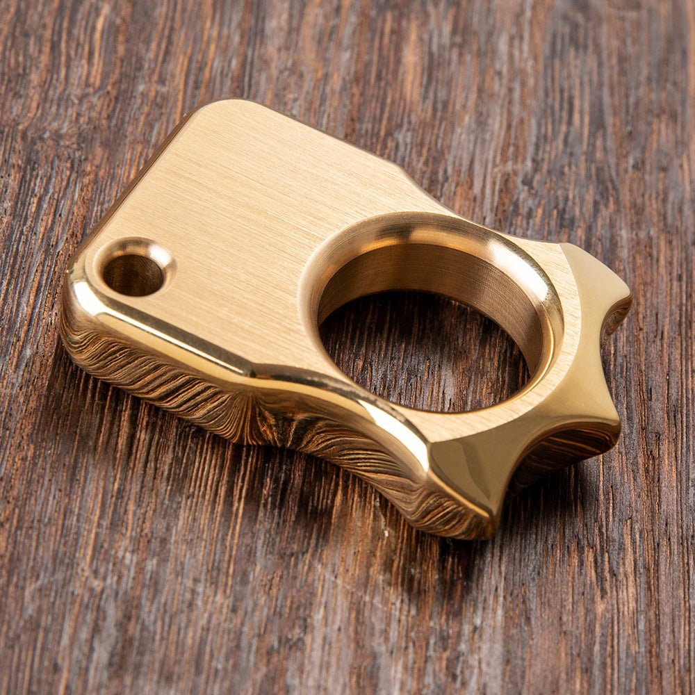 Single-finger brass knuckle