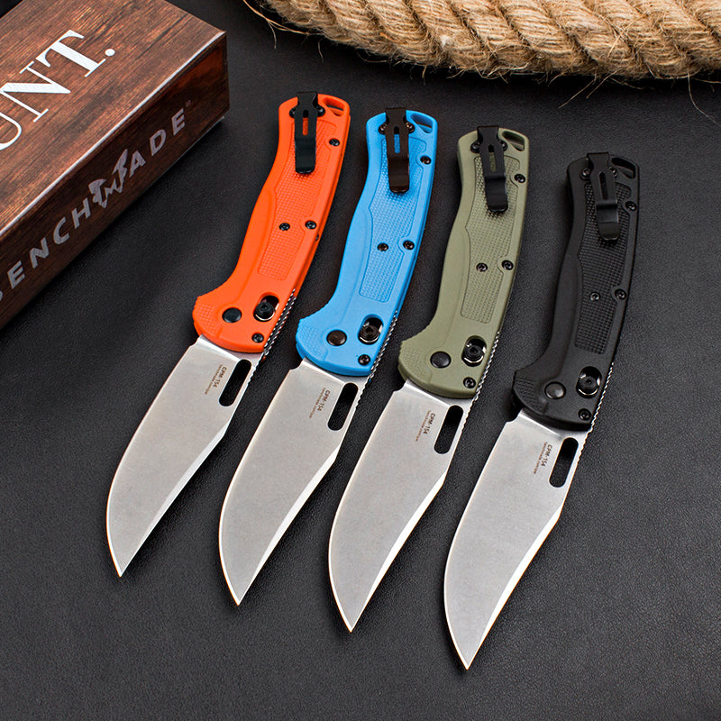 Axis-lock folding knife with fiberglass handle