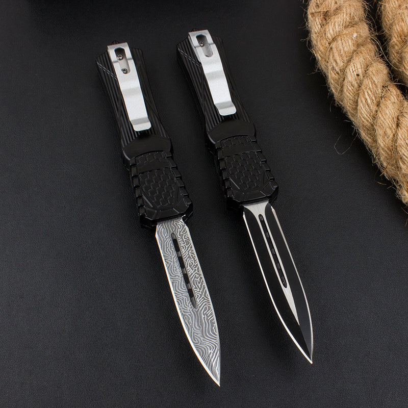 Out-the-Front (OTF) automatic knife