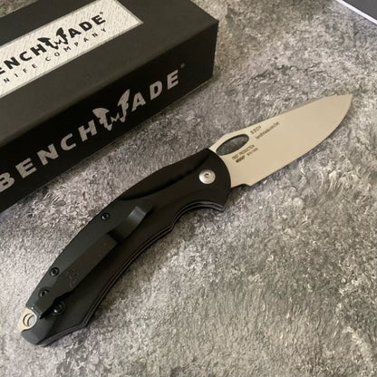 Benchmade 818 Outdoor Folding Knife: Aircraft-grade Aluminum Handle, High-Hardness D2 Steel Blade—Sharp, Compact Tool for Camping and Survival.