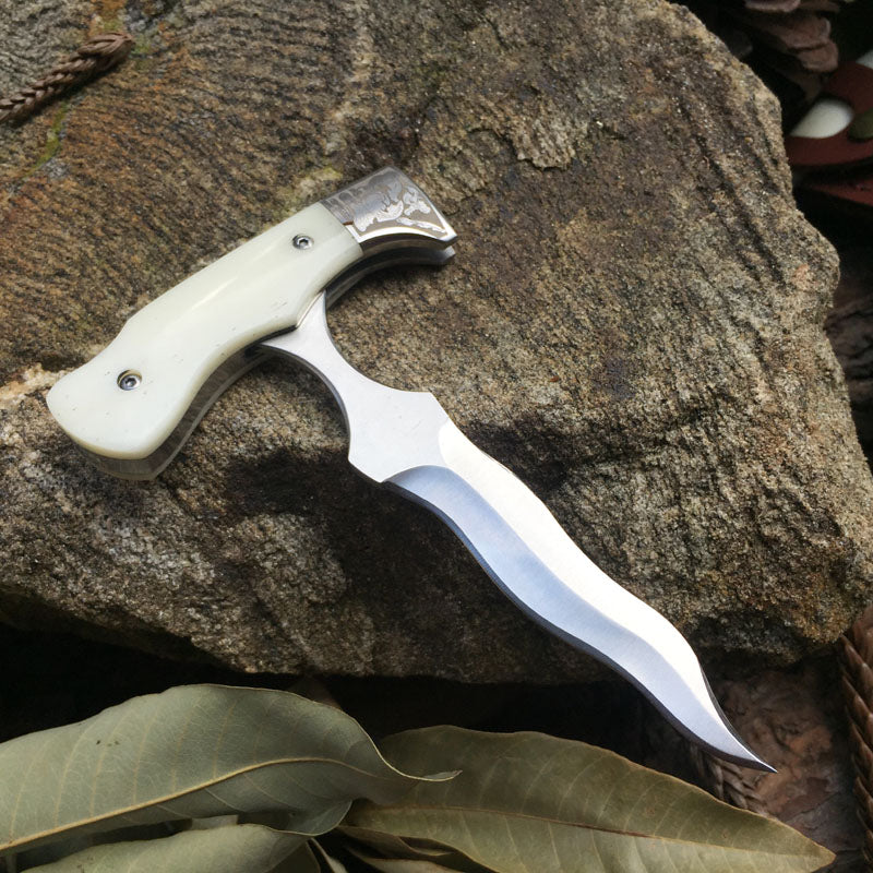 Bone-imitated serpentine hand stiletto