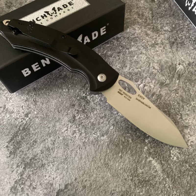 Benchmade 818 Outdoor Folding Knife: Aircraft-grade Aluminum Handle, High-Hardness D2 Steel Blade—Sharp, Compact Tool for Camping and Survival.