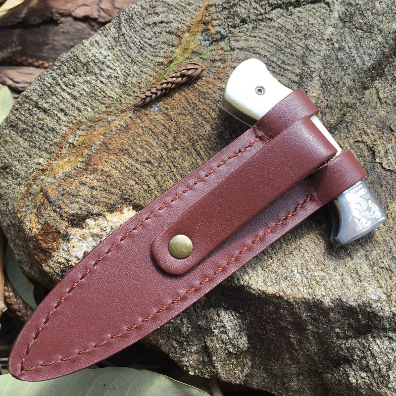 Bone-imitated serpentine hand stiletto