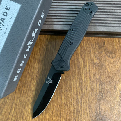 Benchmade 8551BK Outdoor Folding Knife with Fiberglass Handle – High-Hardness S35V Steel, Titanium-Coated Blade; Suitable for Wilderness Survival, Fishing, and General Utility.