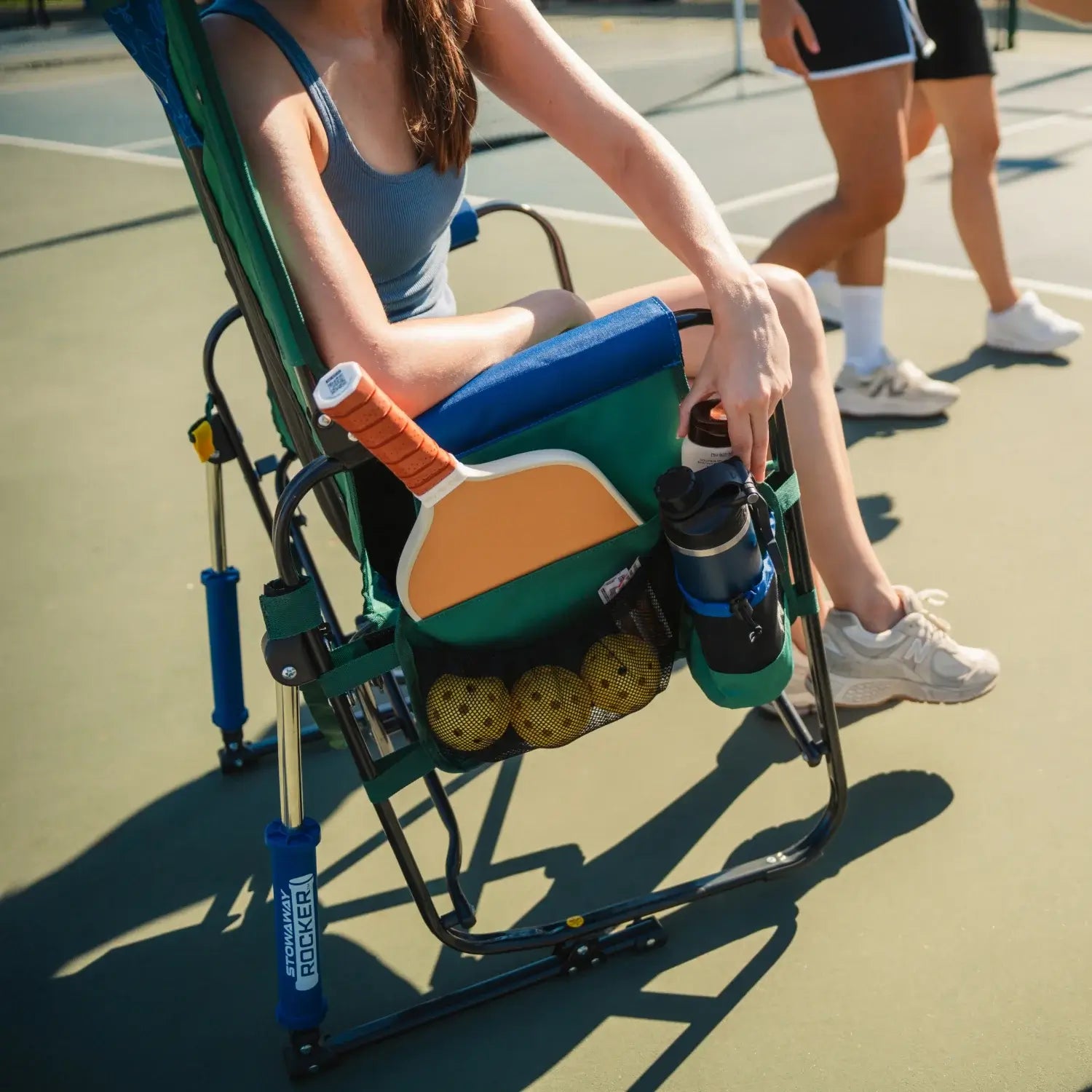 Versatile side caddy on the pickleball stowaway rocker. 