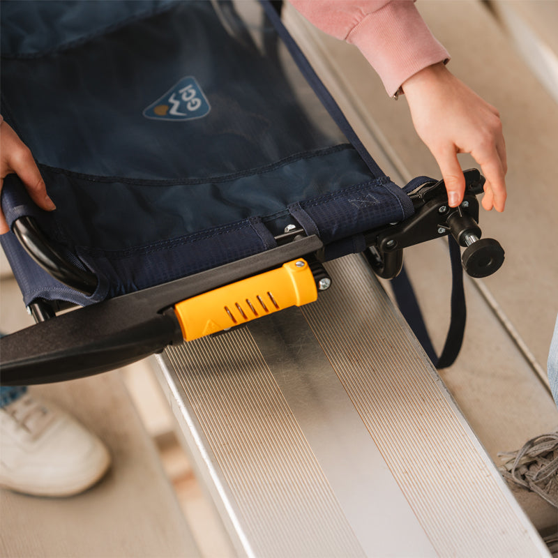 Close-up of knob securing rich blue Stadium Rock-Cliner to bleacher bench.