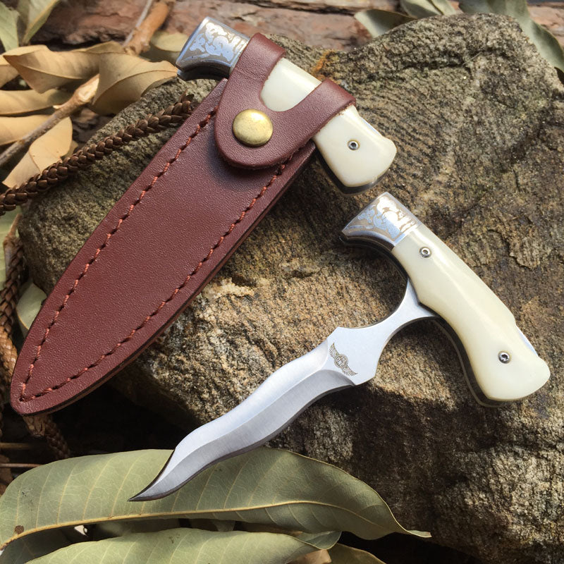 Bone-imitated serpentine hand stiletto