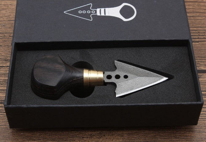 Ebony arrowhead hand stiletto