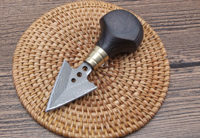 Ebony arrowhead hand stiletto